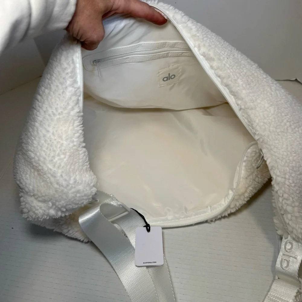 Alo Yoga Sherpa On The Go Sling Bag in ivory